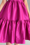 Short dress with a layered cloche, fuchsia color