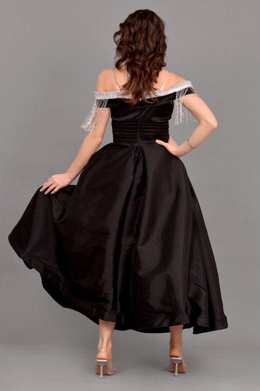 Evening dress with off-the-shoulder collar, decorated with tassels, black