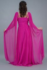 Pleated dress with cape sleeves, fuchsia color