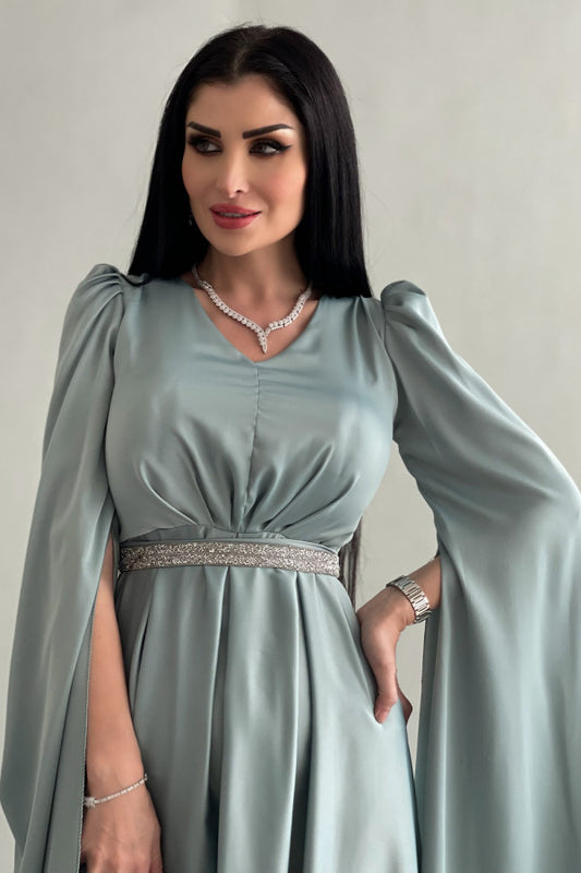 Asymmetric dress with cape sleeves in Tiffany