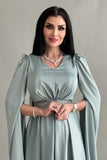 Asymmetric dress with cape sleeves in Tiffany