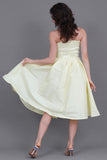 Short evening dress with embroidered bow, yellow