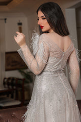 Beige feather embellished off shoulder evening dress 