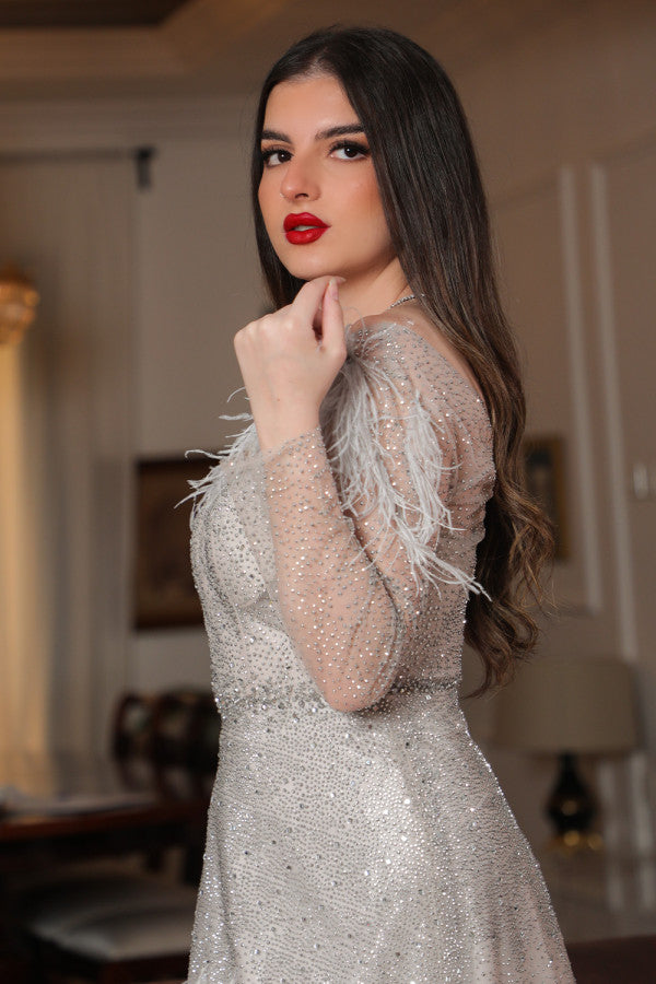 Beige feather embellished off shoulder evening dress 