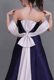 Mikado taffeta evening dress with a bow at the back