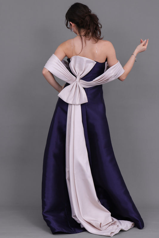 Mikado taffeta evening dress with a bow at the back