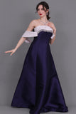 Mikado taffeta evening dress with a bow at the back