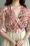 Chiffon dress with wavy patterns, brick color
