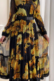 Midi dress with a contrasting layered design with a belt at the waist, black and yellow