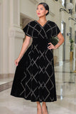 Elegant black velvet midi dress with crystals