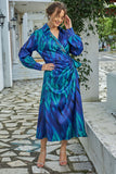 Midi dress with a tie at the waist, decorated with fringes and crystals, blue color