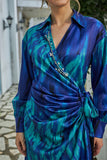 Midi dress with a tie at the waist, decorated with fringes and crystals, blue color