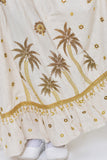 Linen jalabiya with palm embroidery and decorated with beads and lulu 