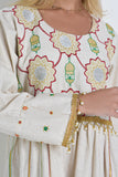 Jalabiya with embroidered lines and colorful patterns, decorated with beads and pearls