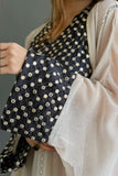 Two-piece galabiya with polka dots on the chest and sleeves