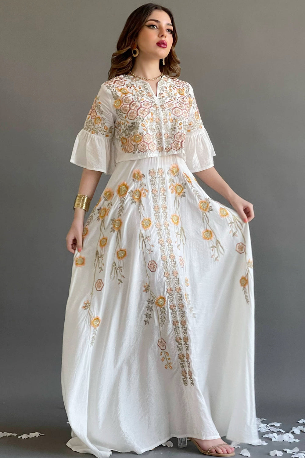 Jalabiya with wide hayr sleeves and floral embroidery