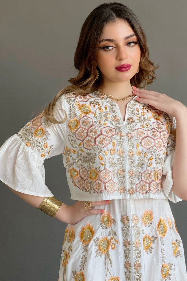 Jalabiya with wide hayr sleeves and floral embroidery