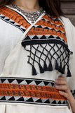 Jalabiya with Sadu pattern decorated with beige tassels