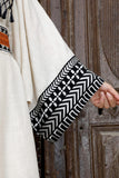 Jalabiya with Sadu pattern decorated with beige tassels