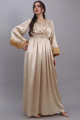 Jalabiya with embroidered dress design and decorated with a golden fringe