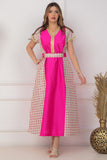 Oriental galabiya with embroidered sides and a fuchsia belt 