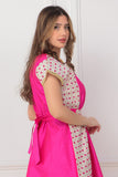 Oriental galabiya with embroidered sides and a fuchsia belt 