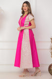 Oriental galabiya with embroidered sides and a fuchsia belt 