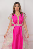 Oriental galabiya with embroidered sides and a fuchsia belt 