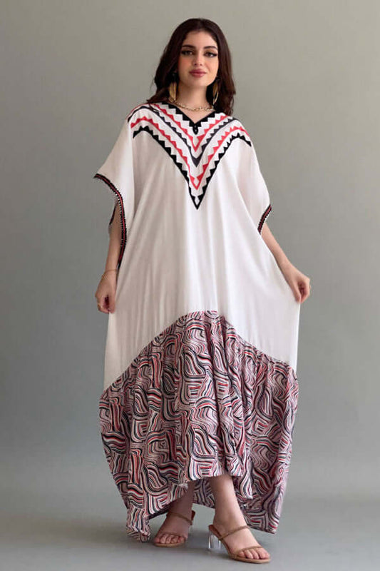 Bisht jalabiya with a floral pattern on the bottom, pink color