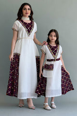 Kuwaiti girls' jalabiya with embroidered sides, sugar color and oud