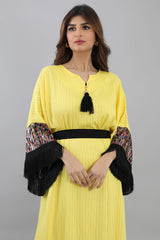 Jalabiya with sleeves embroidered with sequins and decorated with fringes, yellow colour 