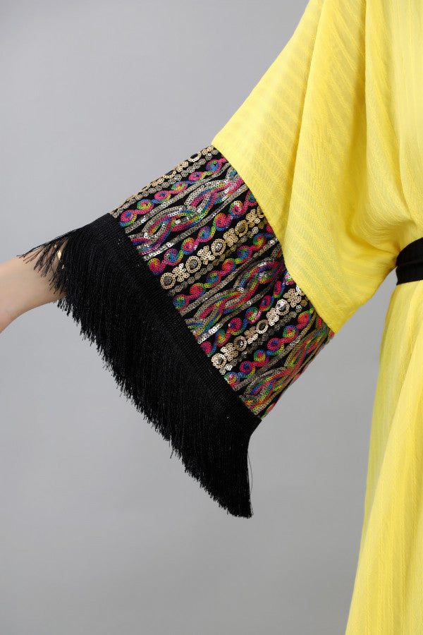 Jalabiya with sleeves embroidered with sequins and decorated with fringes, yellow colour 