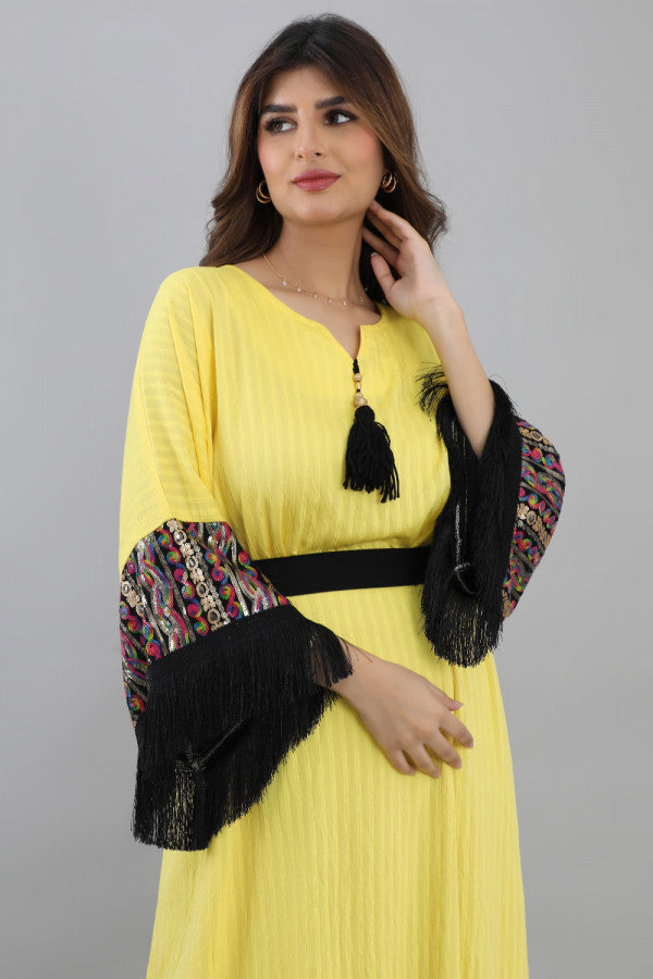 Jalabiya with sleeves embroidered with sequins and decorated with fringes, yellow colour 