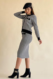 Two-piece sweatshirt and midi skirt with button rows
