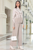 A winter set of pants and a blouse with a wide design, beige 