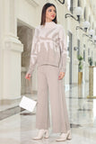 A winter set of pants and a blouse with a wide design, beige 