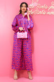 Wide-leg trousers and top set in fuchsia colour