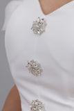 White jumpsuit with a wide design, decorated with a crystal brooch