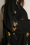 Abaya embroidered with yellow flowers