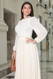 White lace sweater dress with belt at the waist 