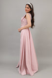 Evening dress embroidered with a pink train design