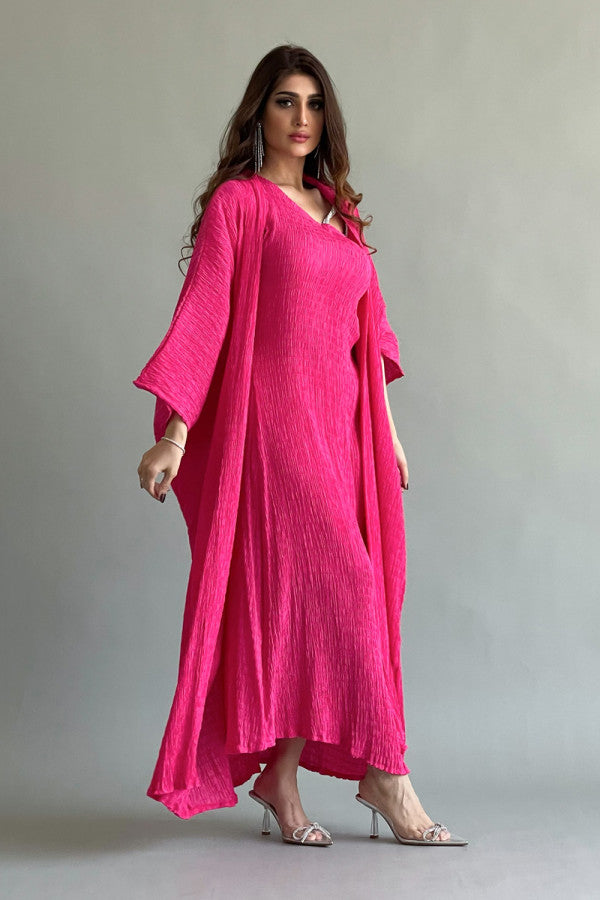 An elegant two-piece jalabiya with modern details, fuchsia color 