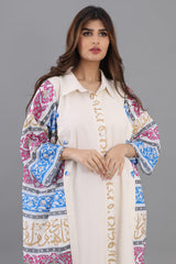 A wide oriental galabiya with Islamic patterns, mauve and blue colours 
