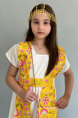 A Kuwaiti girls' jalabiya with a flowing shawl, embroidered and decorated with yellow tassels 