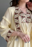 Two-piece jalabiya embroidered with yellow sequins