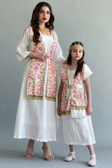 A Kuwaiti girls' jalabiya with a flowing shawl, embroidered and decorated with tassels, in beige colour 