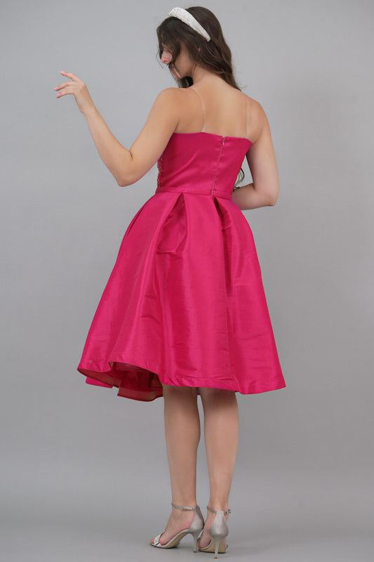 Evening dress with embroidered bodice and pleats, fuchsia color