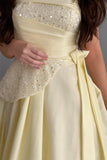 Yellow evening dress with pleated sequins