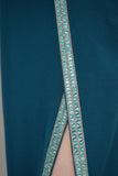 Maxi dress with tulle sleeves decorated with a turquoise crystal ribbon