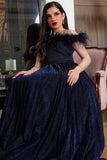 Navy blue evening dress decorated with feathers